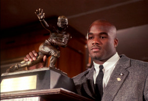 Colorado's Rashaan Salaam poses with the 1994 Heisman Trophy which he was awarded Saturday, Dec. 10, 1994, at the Downtown Athletic Club in New York. Salaam, attempting a comeback with the Oakland Raiders, says an addiction to marijuana made him withdrawn, caused him to fumble and nearly ended his career. Adam Nadel, Associated Press